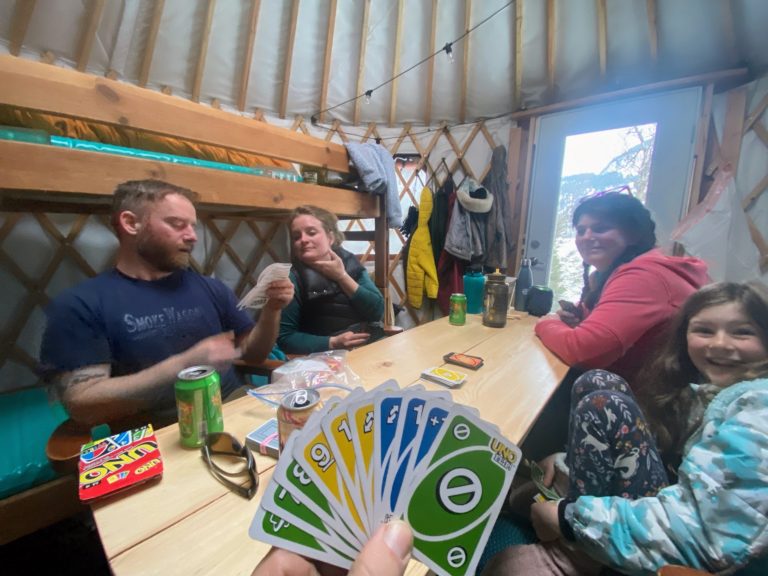 Card games at the yurt on Grant Lake