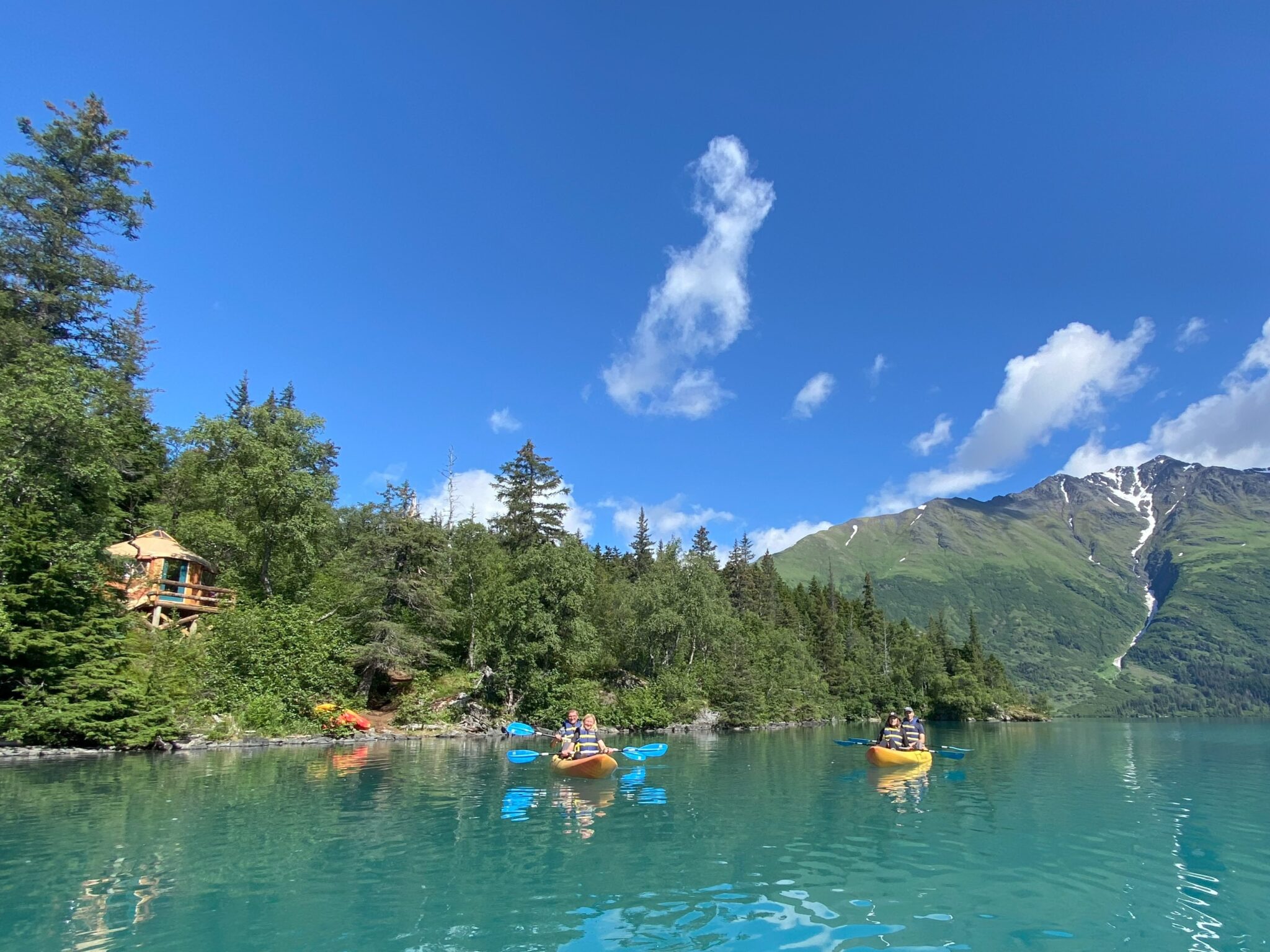Kayakers in Front of Grant Lake Yurts