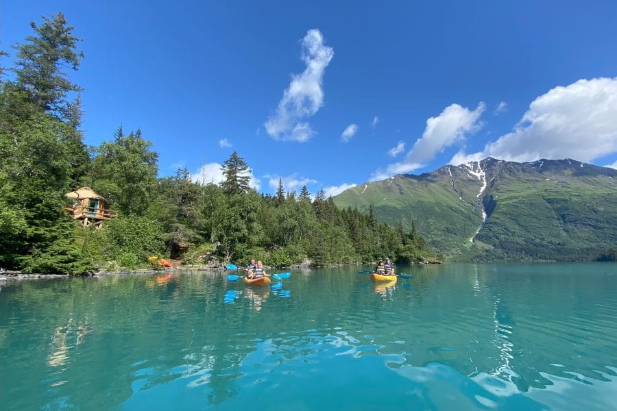 Kayakers in Front of Grant Lake Yurts
